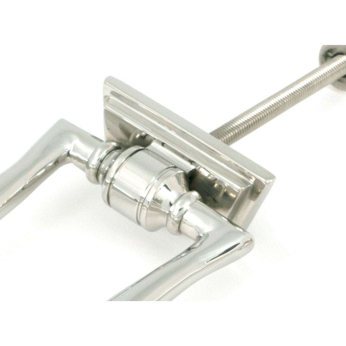 The Art Deco Geometric Loop Door Knocker in Polished Stainless Steel with a Close up of the Hinge Mechanism