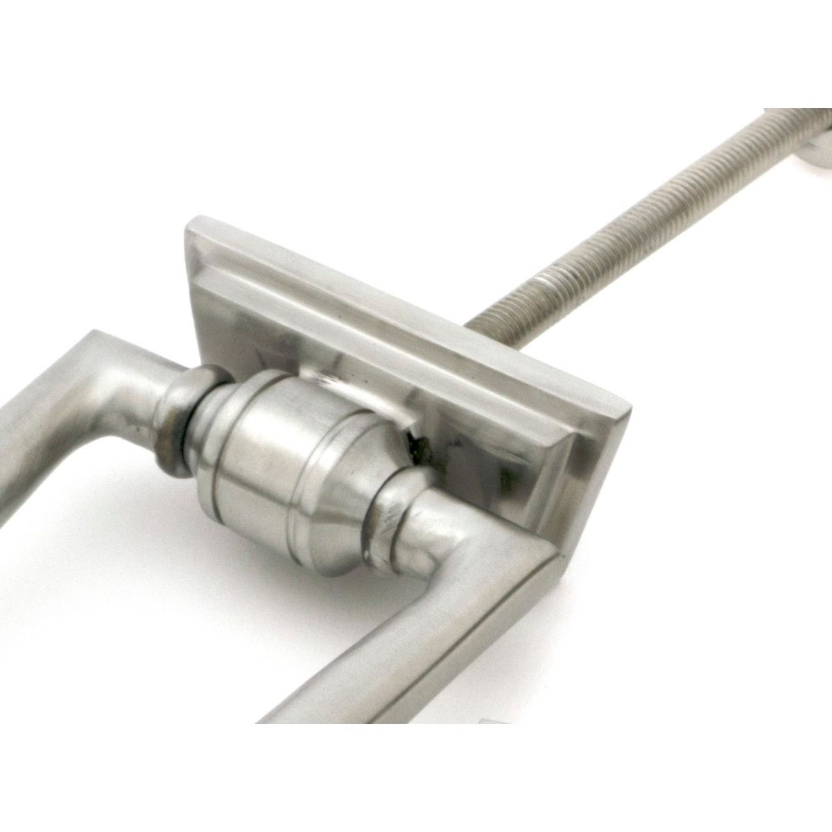 The Art Deco Geometric Loop Door Knocker in Satin Stainless Steel with a Close up of the Hinge Mechanism