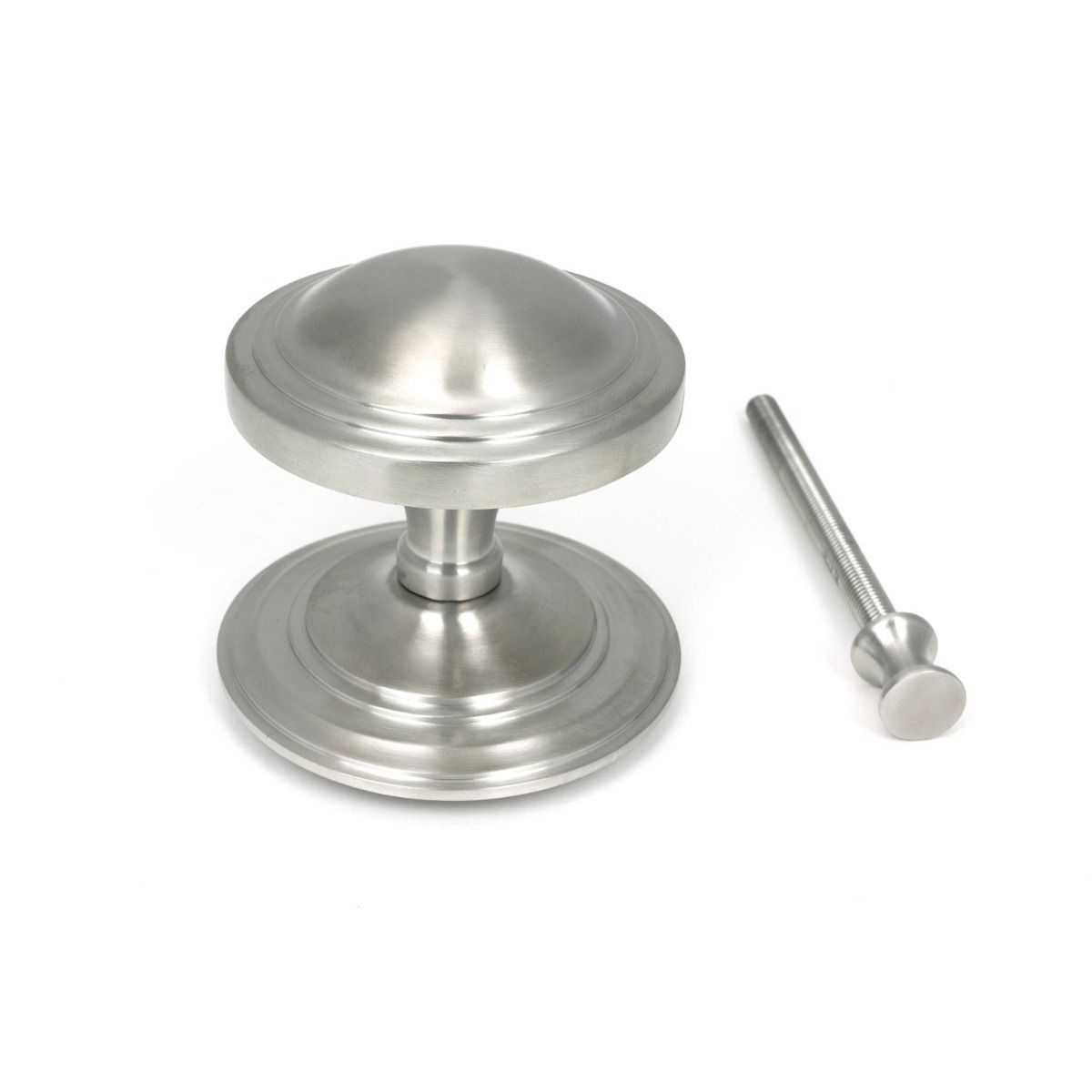The Art Deco Stepped Rose Center Door Knob in Satin Stainless Steel Shown Upright with Fitting Bolt