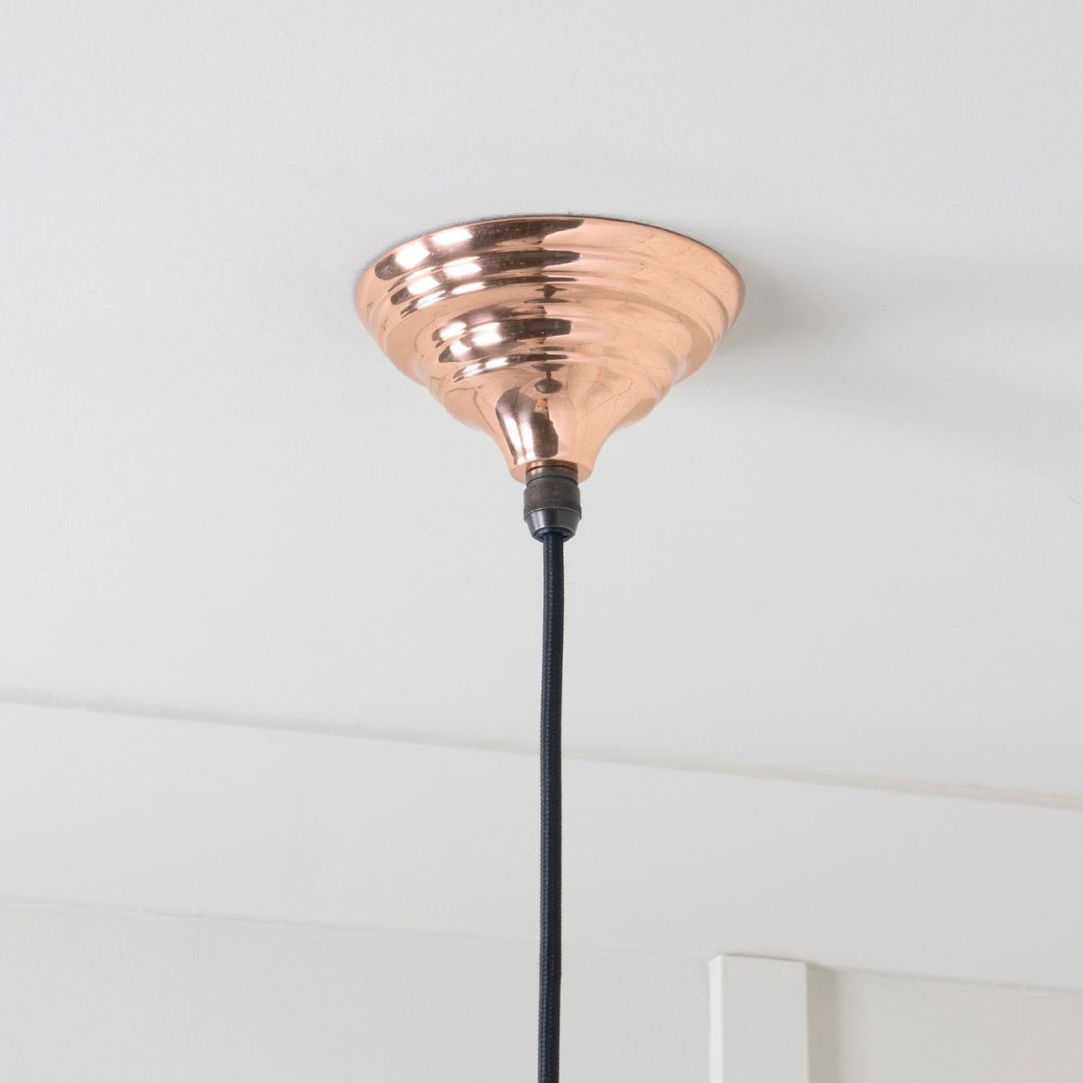 The Aura Dome Pendant Light in Copper and White Gloss Showing a Close up of the Ceiling Rose