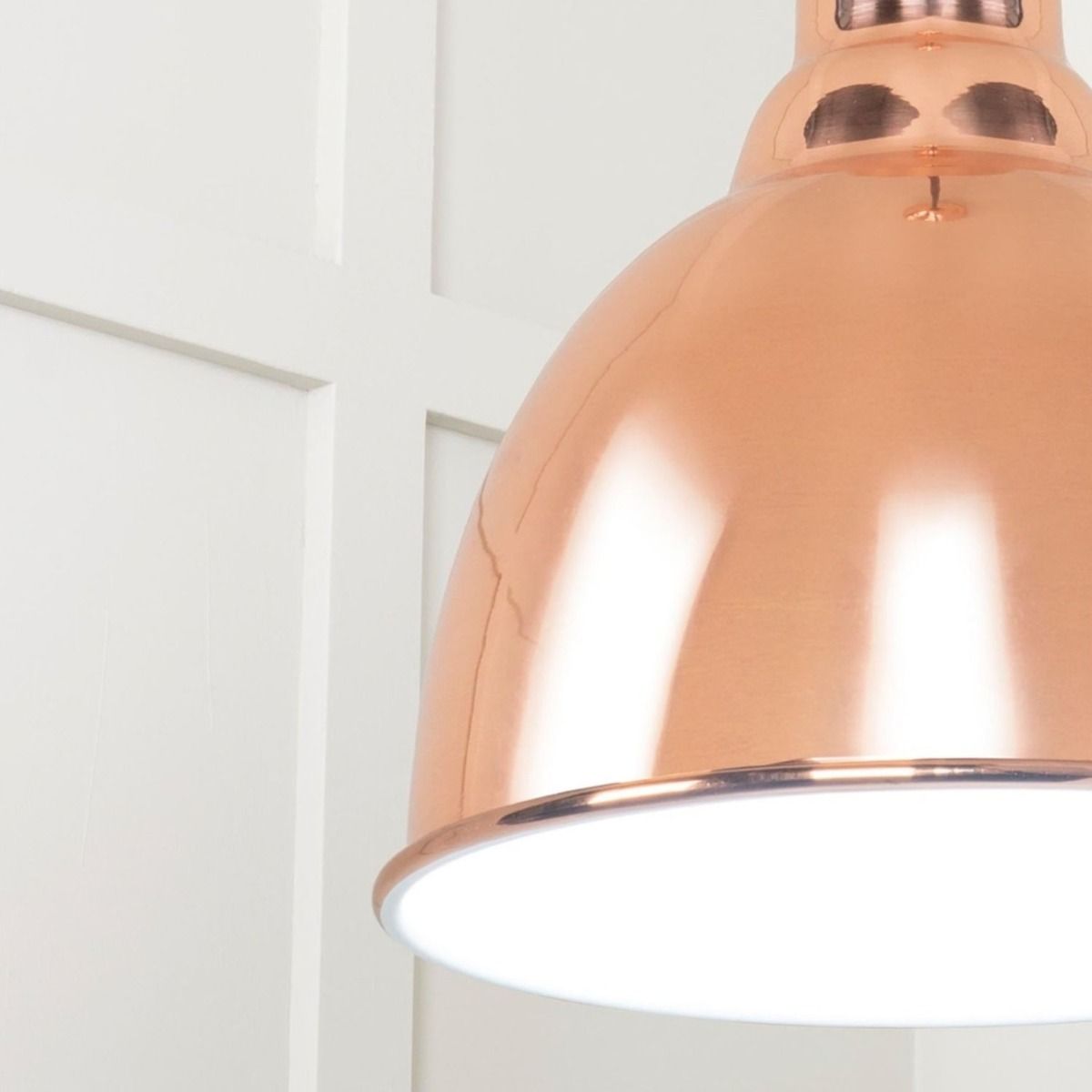 The Aura Dome Pendant Light in Copper and White Gloss Showing a Close up of the Lamp Shade
