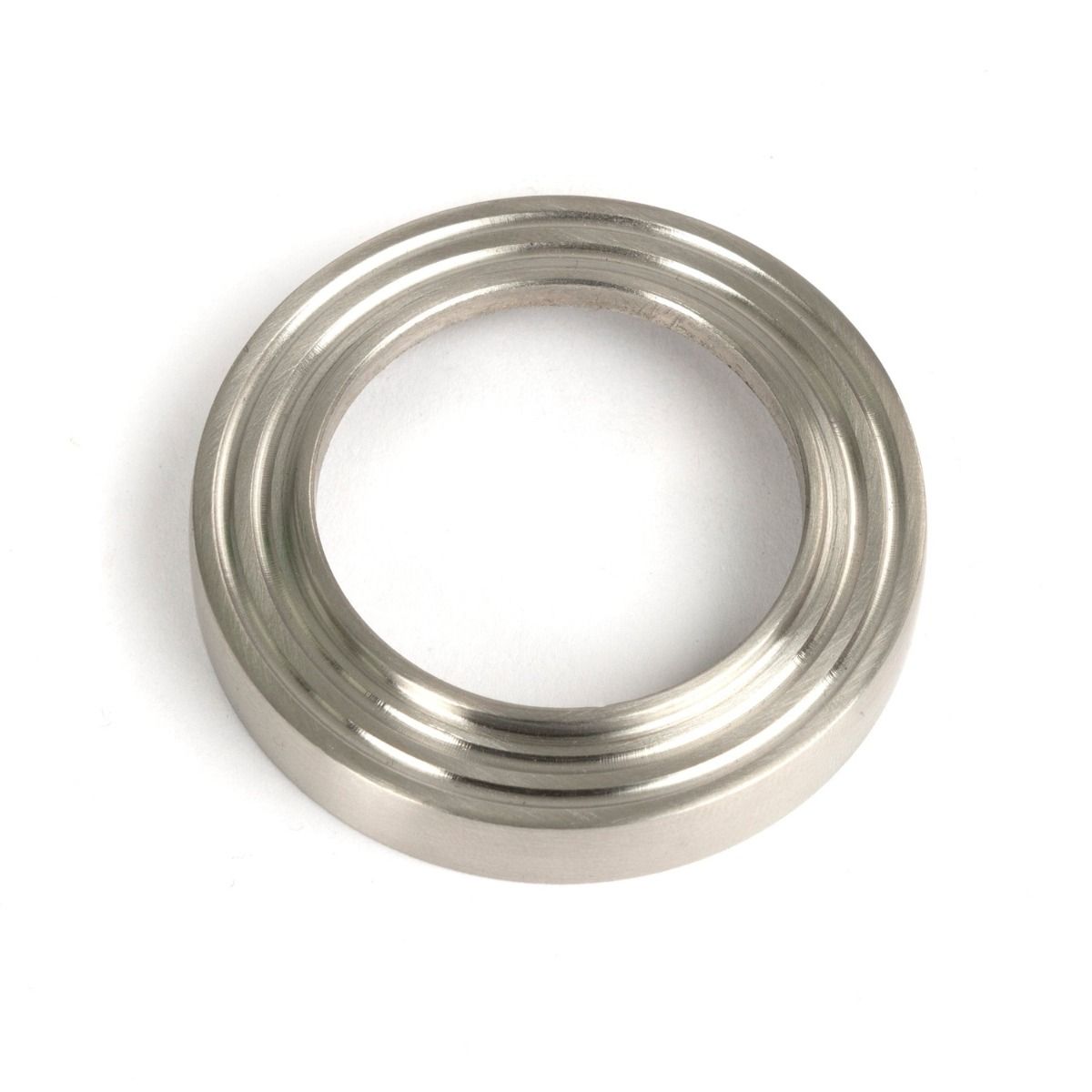 The Beehive Concealed Euro Keyhole Escutcheon in Satin Stainless Steel Showing Just the Backplate on a White Background