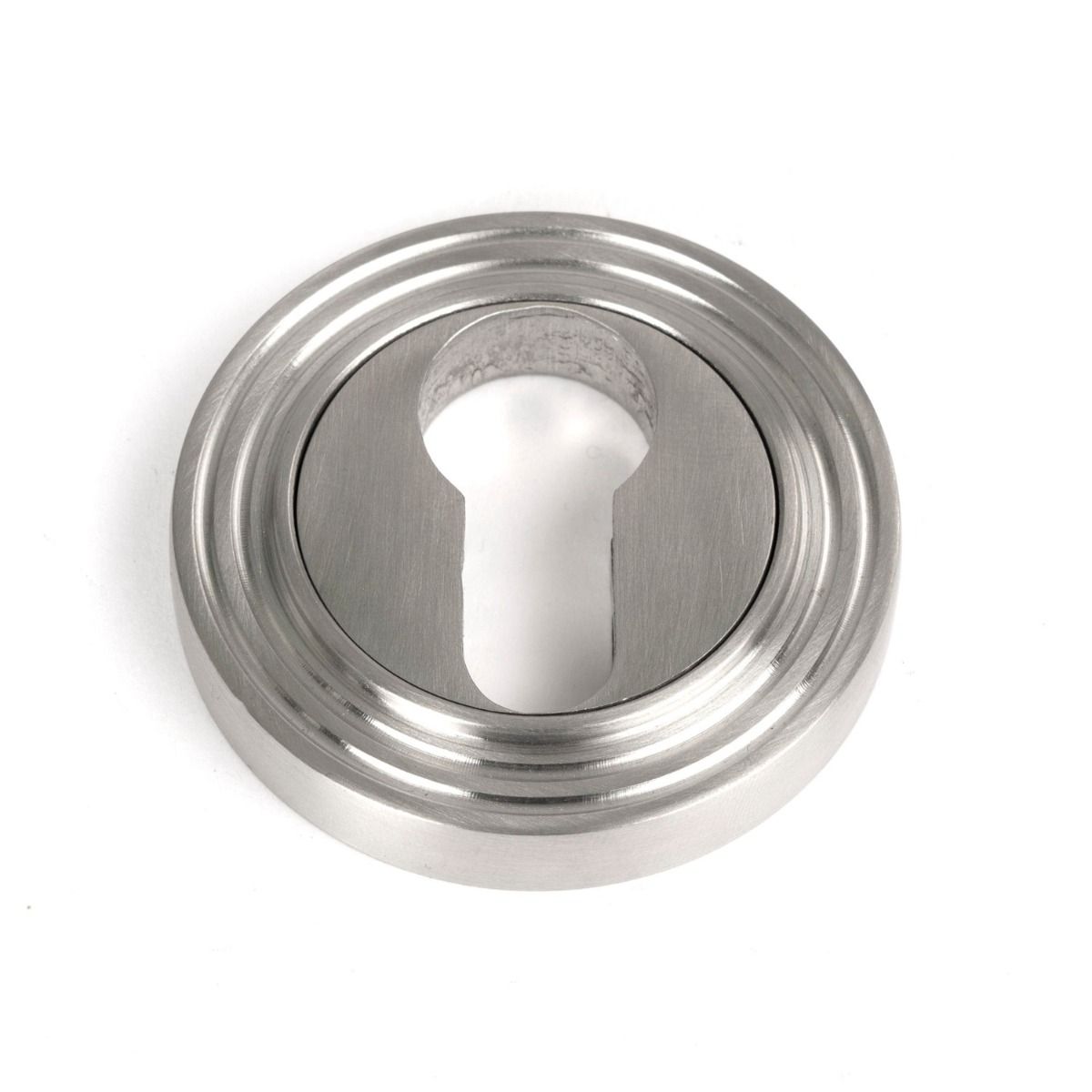 The Beehive Concealed Euro Keyhole Escutcheon in Satin Stainless Steel Shown on a White Background