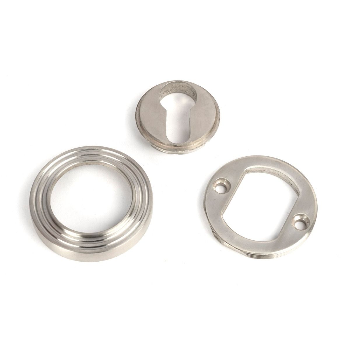 The Beehive Concealed Euro Keyhole Escutcheon in Satin Stainless Steel Shown with all Components on a White Background