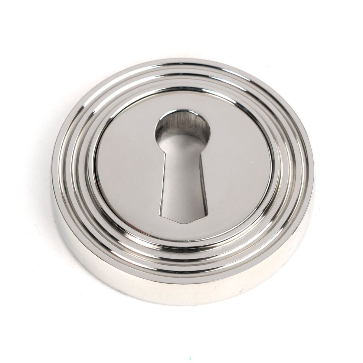 The Beehive Concealed Standard Keyhole Escutcheon in Polished Stainless Steel Shown on a White Background