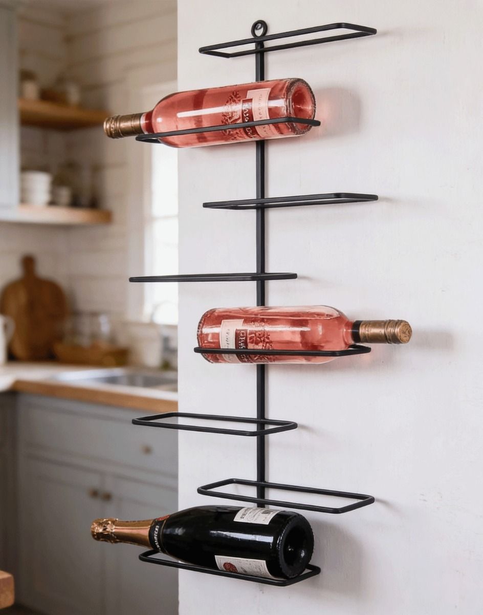 The "Beneventio" Wrought Iron Wine & Bottle Rack Displaying some Bottles of Wine and Champagne next to a Modern Kitchen - Digital Illustration