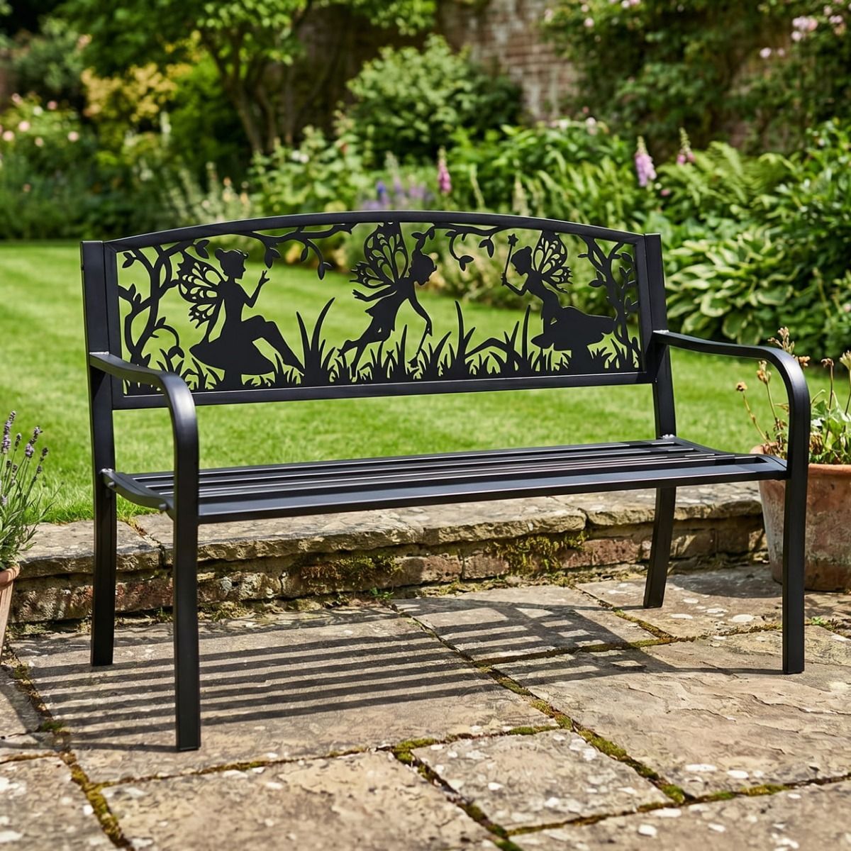 The Bespoke Fairy Trio Iron & Steel Park Bench in Black in a Walled Garden in Front of a Verdant lawn - Digital Illustration