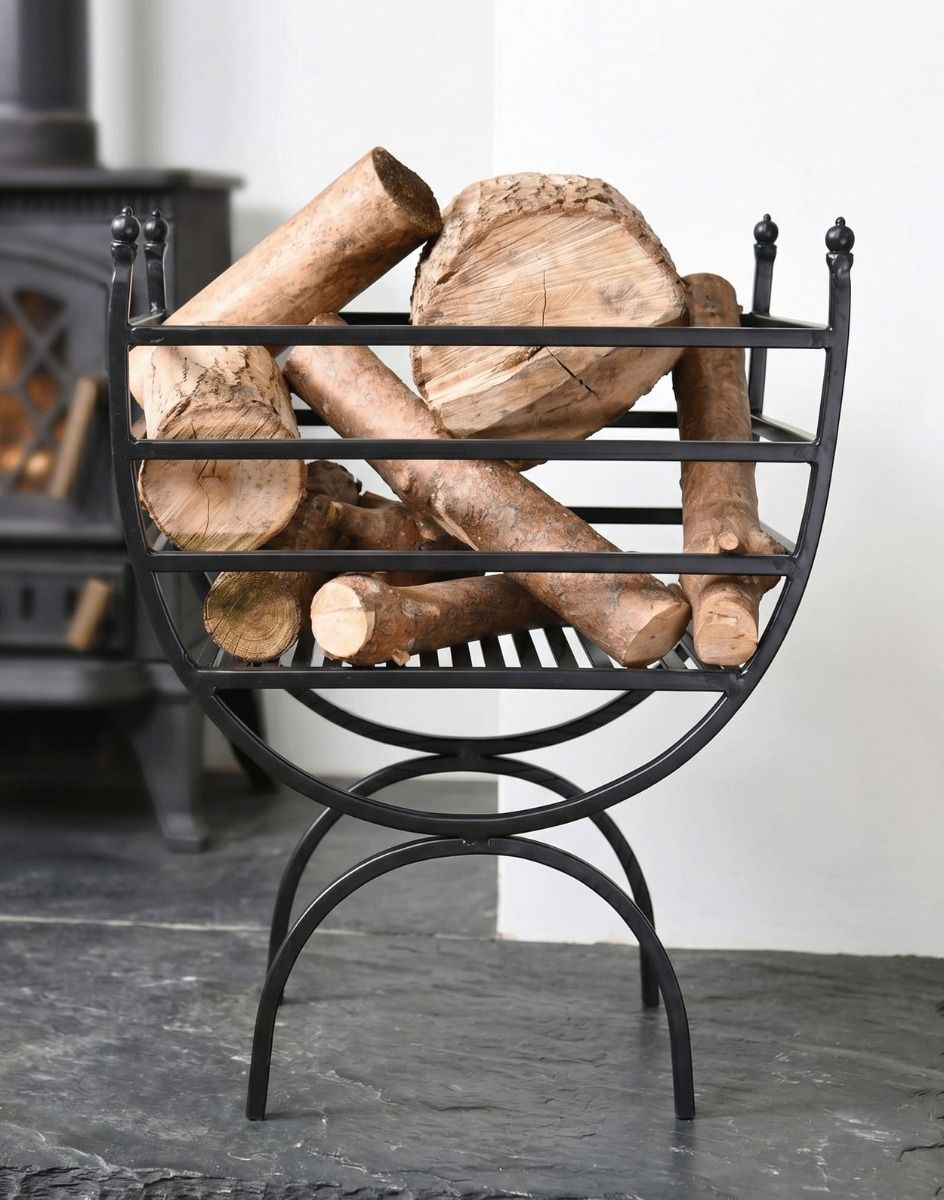 The Black Curved Iron Log Rack & Holder next to a White Fireplace with a Wood Burner Stove - Digital Illustration