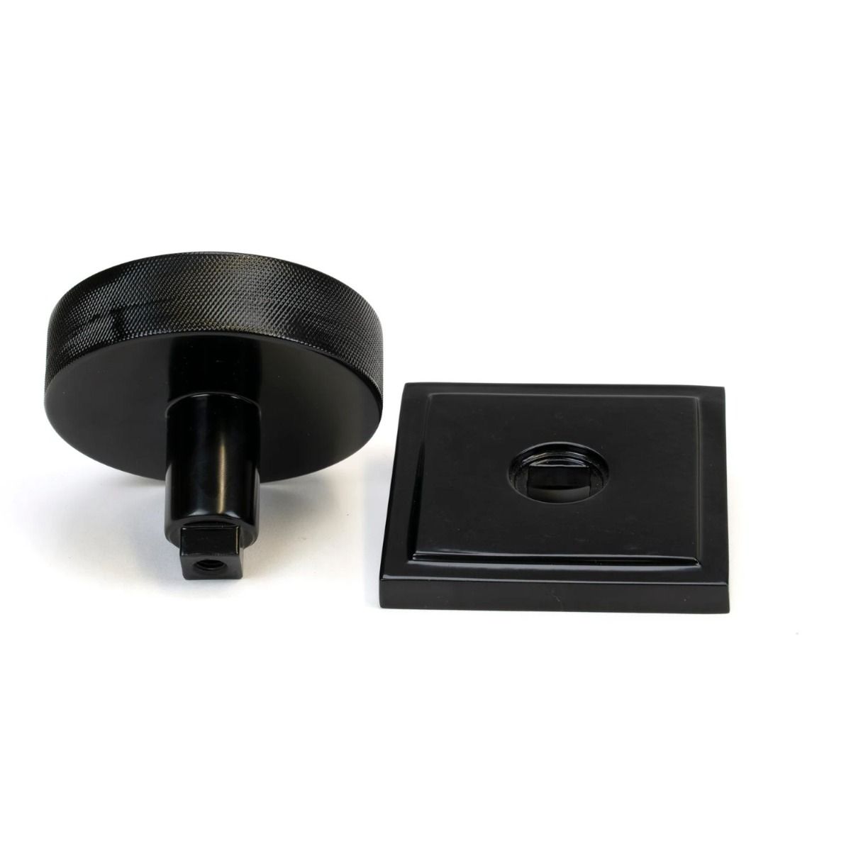 The Black Knurled Centre Door Knob on a Square Rose Displayed in Separate Sections on a White Background 