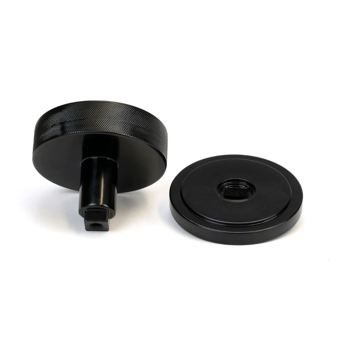 The Black Knurled Centre Door Knob on an Art Deco Rose Displayed in Separate Sections 