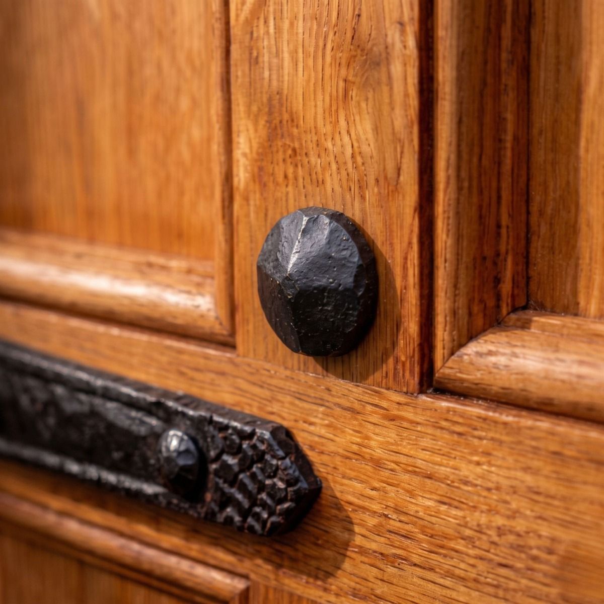 The Blacksmith Door Stud shown Mounted on a Heavy Timber Door - Digital Illustration 