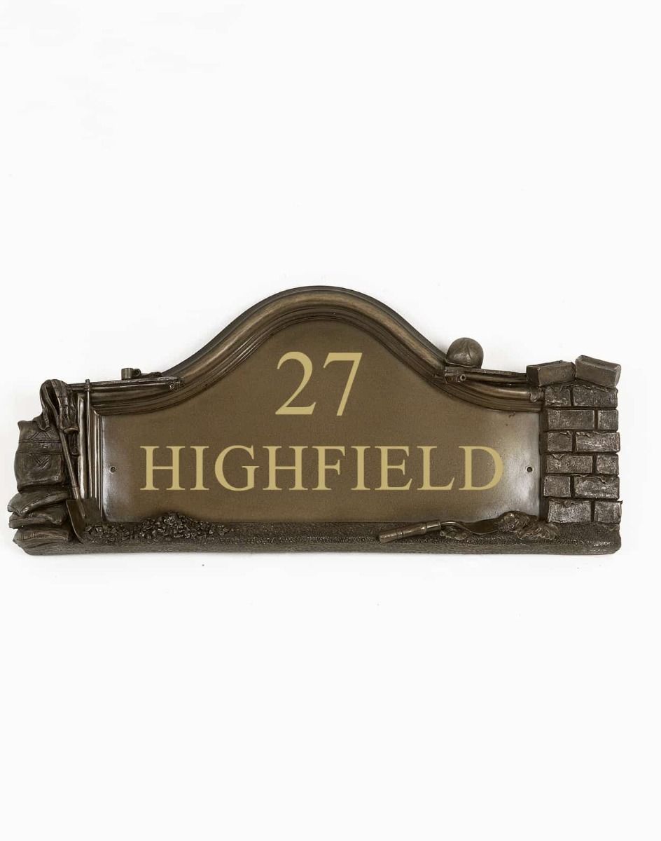 The Bronze Builders House Name Sign on a White Background 