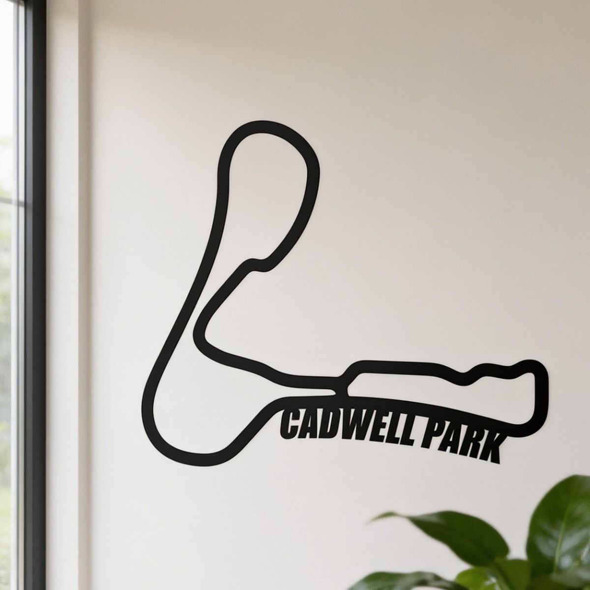 The Cadwell Park Race Track Black Steel Wall Art by a Window and Houseplants in a Modern Home - Digital Illustration