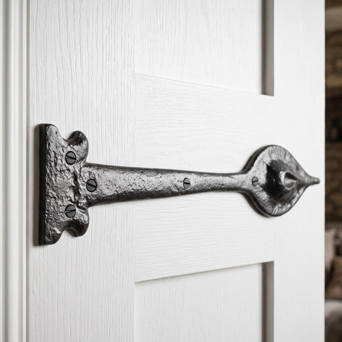 The Cast Iron Leaf Inspired Door Hinge Fitted onto a White Door to give a Traditional Feel - Digital Illustration 