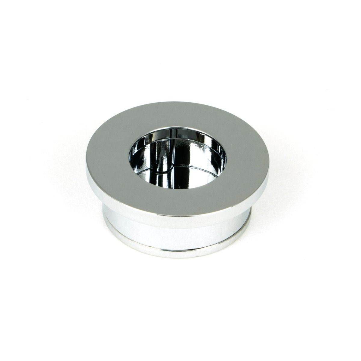 The Circular Pocket Door Edge Pull in Polished Chrome Shown from the Front Laying on a White Background