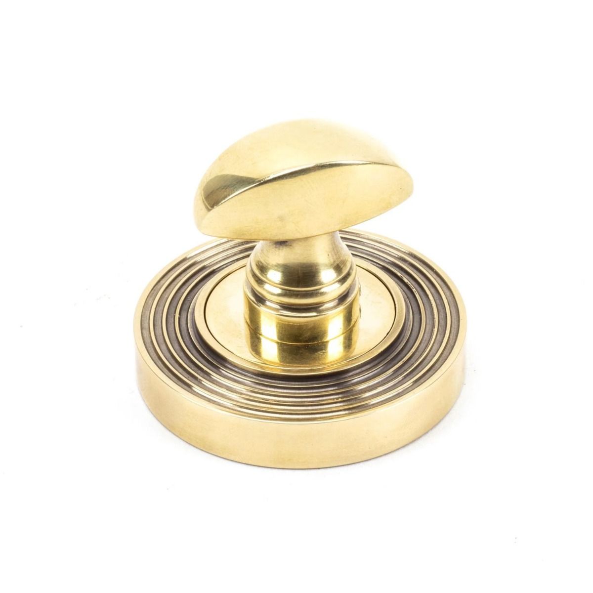 The Concealed Beehive Bathroom Turn & Release Set - Aged Brass on a White Background 
