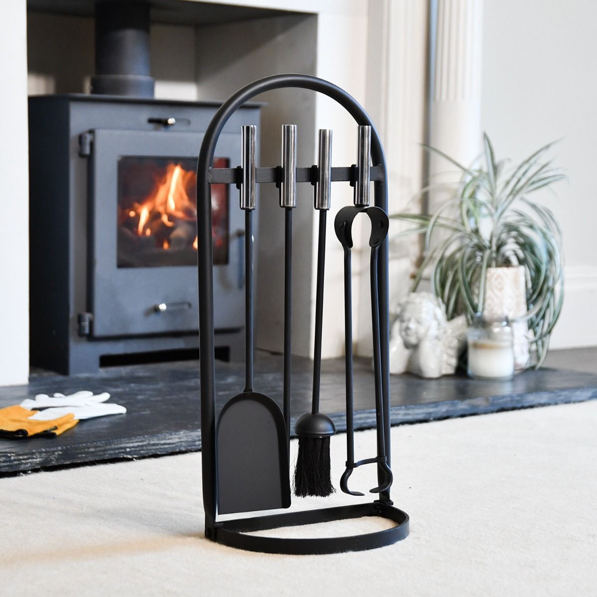 The Cradley Elite Companion Set in Chrome & Iron with a Wood Burner Stove Behind - Digital Illustration