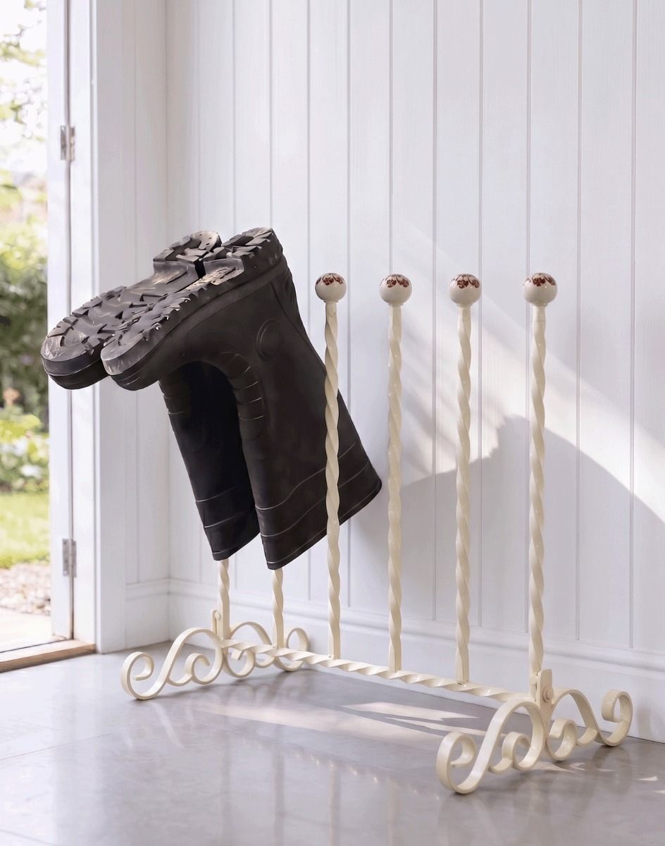 The Cream Grangewood 3 Pair Boot Rack Placed in a Contemporary Cottage Porch Entranceway - Digital Illustration 