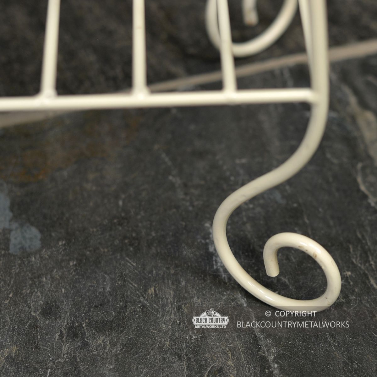 Close-up of the Ornate Curved Feet