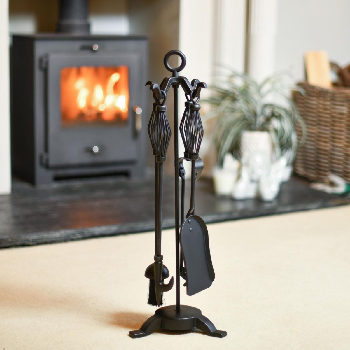 "The Dinnington" Black Companion Set In A Fireplace Setting
