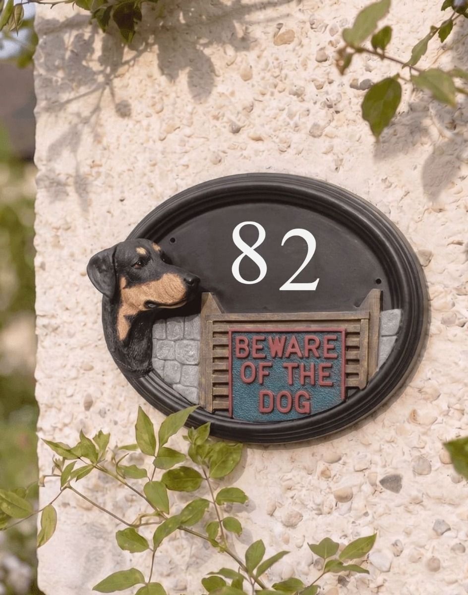 The Doberman Hand painted House Number Sign on a Pebble Wall in a Front Garden - Digital Illustration 