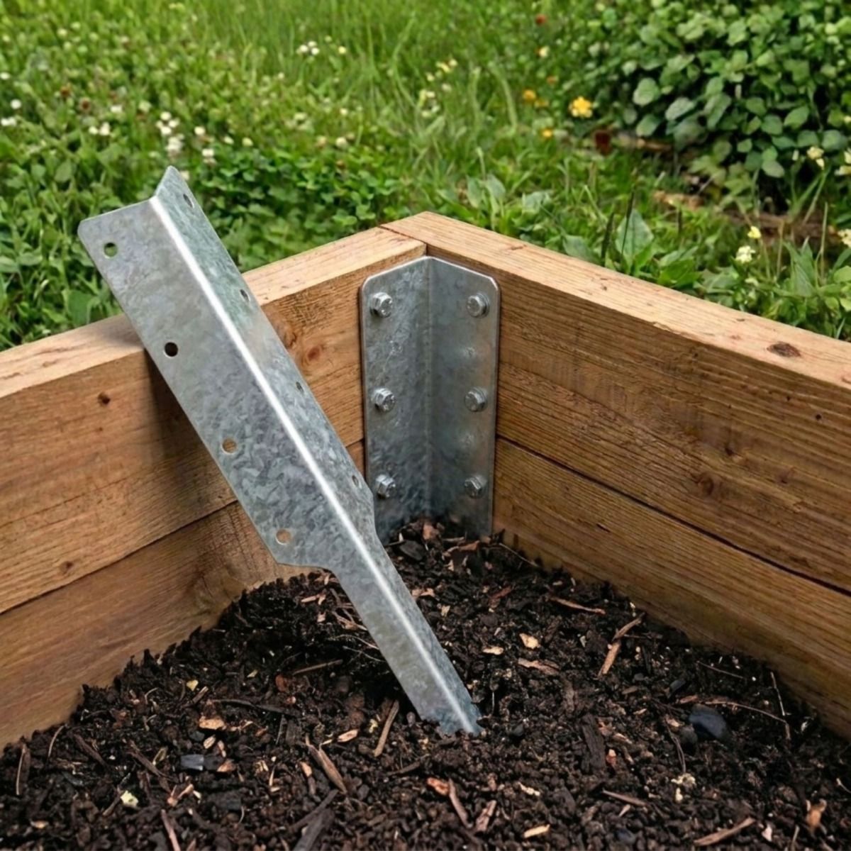 The Double Pre-Galvanised Railway Sleeper Corner Spike Next to a Raised Garden Flower Bed - Digital Illustration