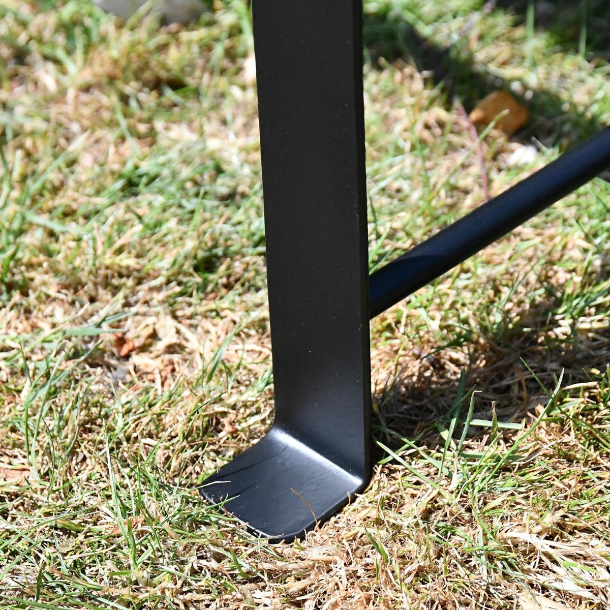 Close-up of the Feet on the Bench