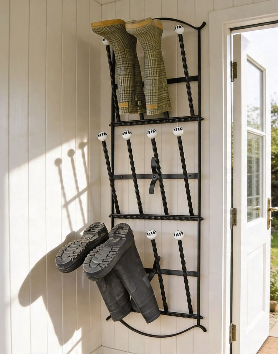 The Edcote Black Wall Mounted 6 Pair Boot Rack Mounted on Wooden Clad Interior Wall - Digital Illustration 
