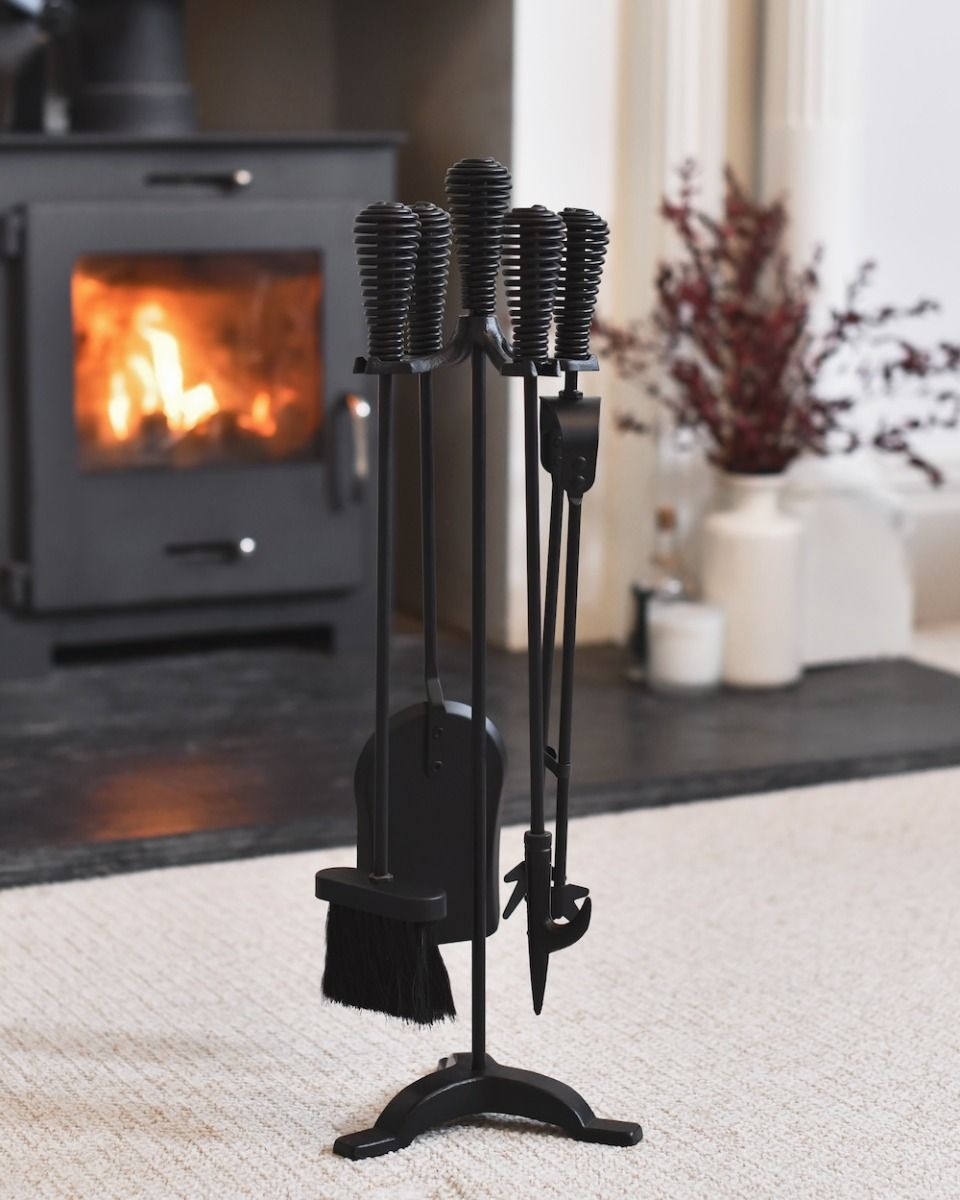 The Elcot Fireside Companion Set with a Wood Burner Stove Behind - Digital Illustration