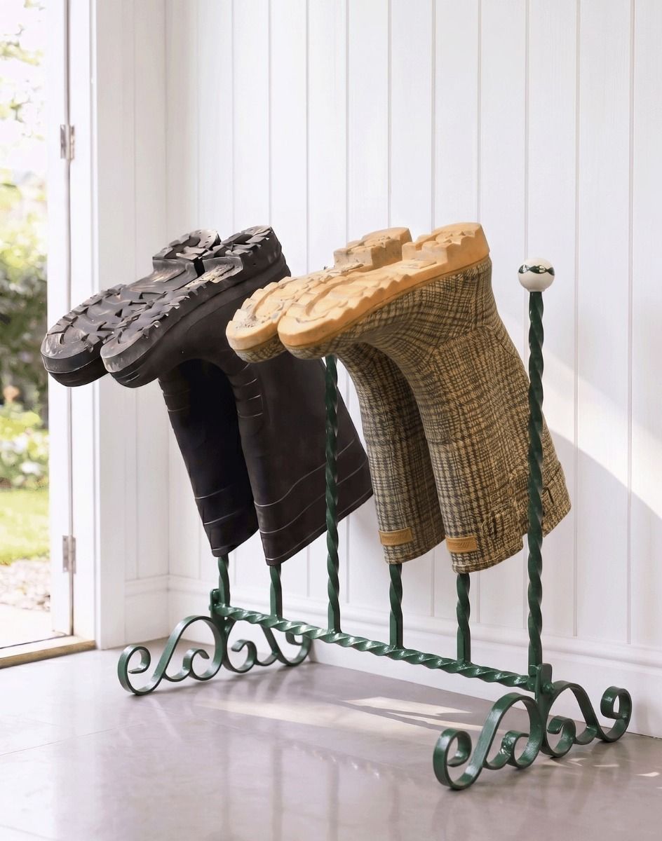 The Estrook Forest Fern Green Three Pair Boot Rack Placed in a Sunny Wooden Porch Entrance - Digital Illustration
