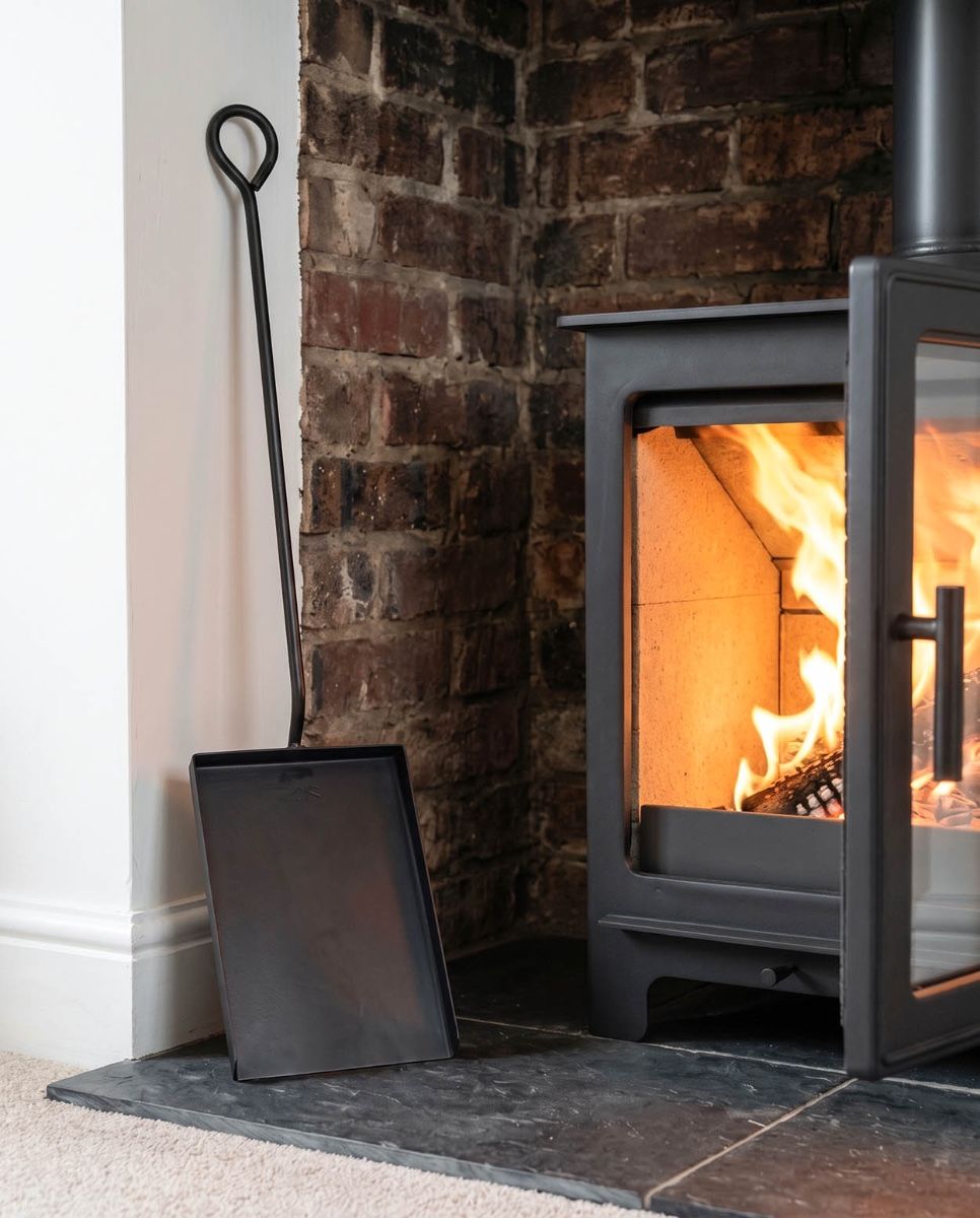 The Extra Long Fireside & Firepit Spade Tool in a Luxury Modern Home Next to a Fireplace - Digital Illustration 