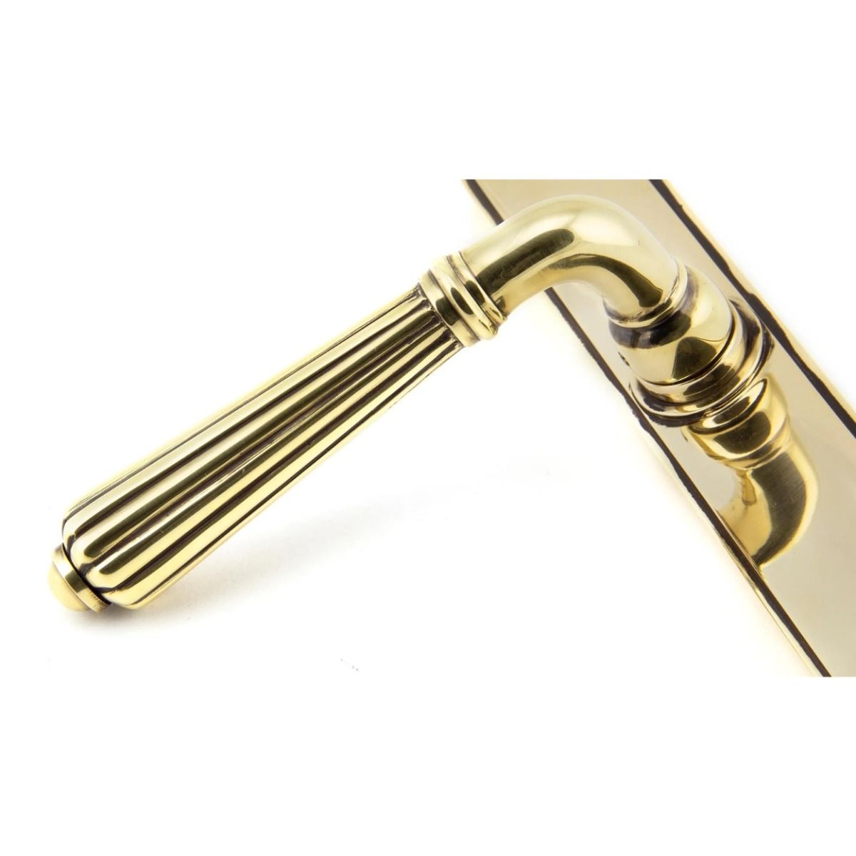 The Fluted Slimline Exterior Door Handle - Aged Brass Finish Showing a Close up of the Handle