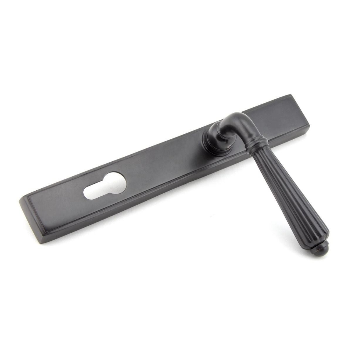 The Fluted Slimline Exterior Door Handle in an Aged Bronze Finish Shown Leaning to the Right
