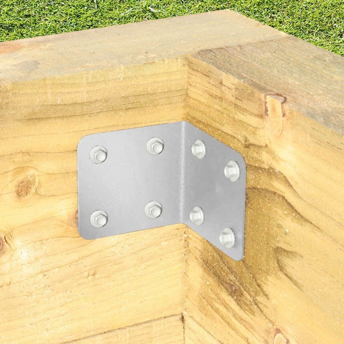 The Galvanised Railway Sleeper Internal Corner Support Bracket Fixed on a White Background a Wooden Raised Planter