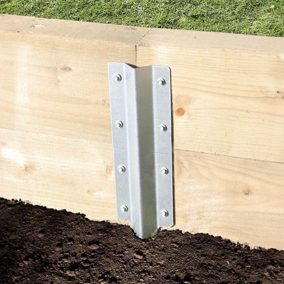The Galvanised Railway Sleeper Straight Inline Spikes - Double on a White Background a Wooden Railway Sleeper Garden Planter