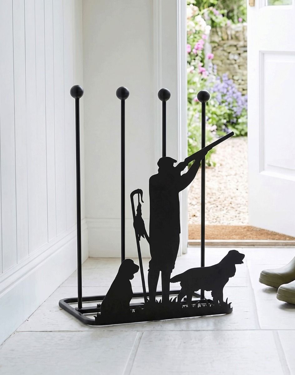 The Game Season Springer Spaniel Steel Boot Rack Placed on a Stone Tile Cottage Entrance Hallway- Digital Illustration