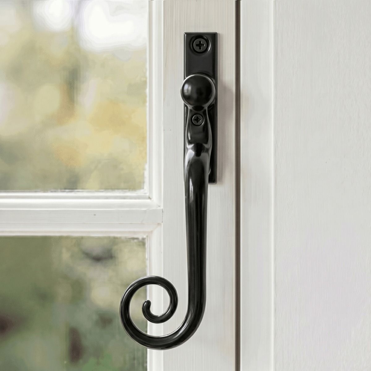 The Glossy Black Monkeytail Espagnolette Window Handle Fittted on a Classic White Painted Window Frame - Digital Illustration 