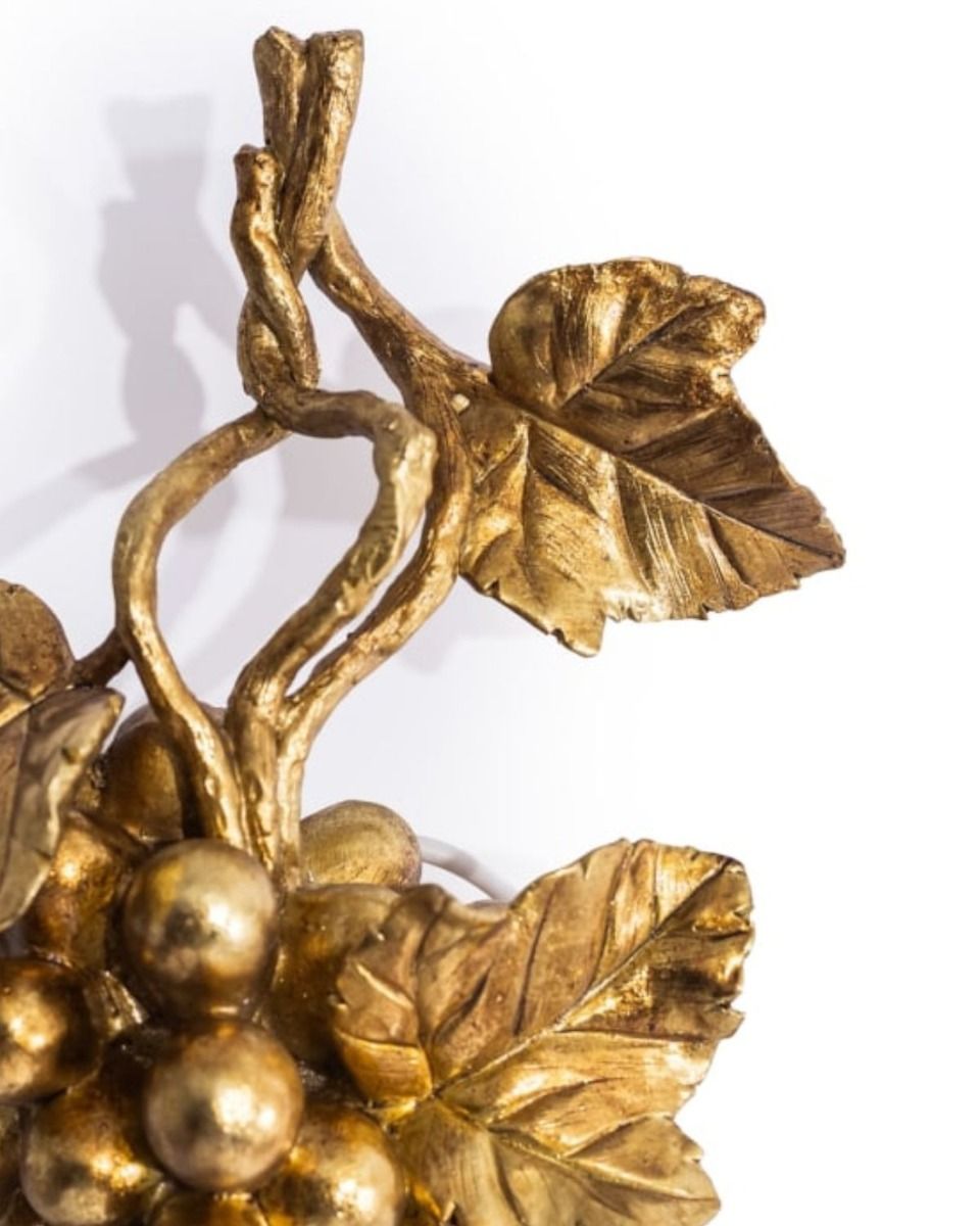 The Gold Finish Fruits of the Vine Wall Light with a Close up of the Detailing on the Leaves 