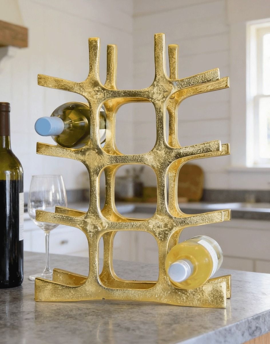 The Gold "Kempton House" Wine Rack Displayed in a Modern White Kitchen Next ot a Wine Bottle - Digital Illustration
