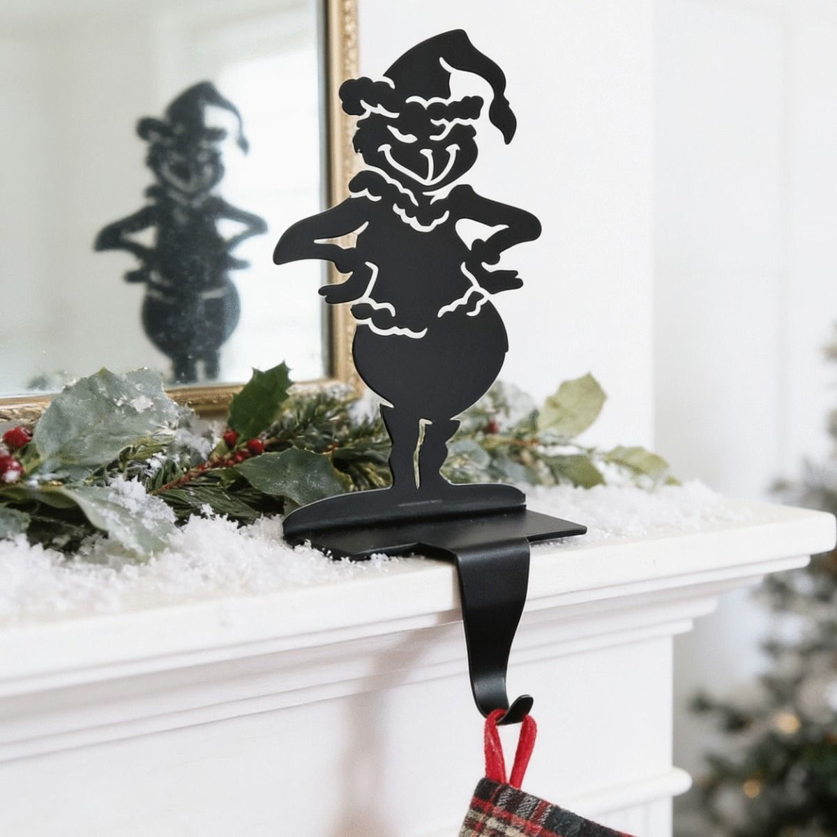 The Grinch Stocking Holder Displayed on the Edge of a White Mantelpiece - Digital Illustration