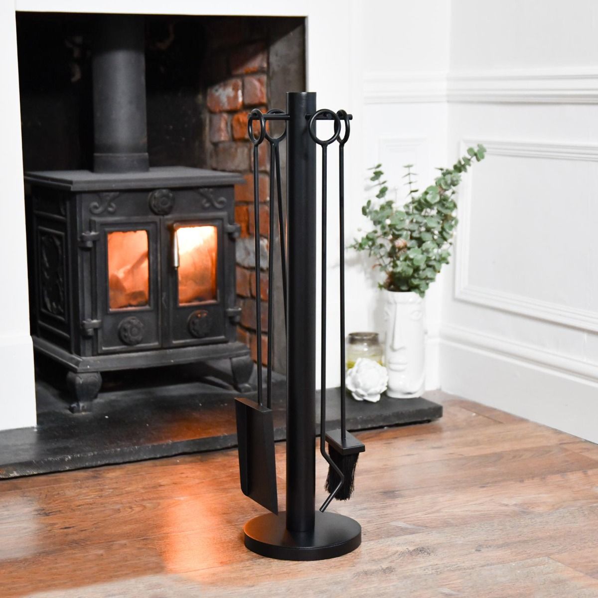 The "Hampstead House" Companion Set in a Modern Interior Setting next to a Log Burner Stove