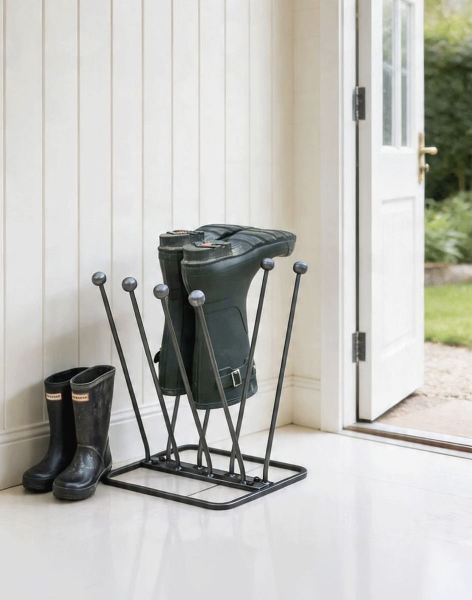 The High-Quality Metal 4 Pair Boot or Wellie Rack Placed On a Cream Coloured Tile Floor Cottage Porch - Digital Illustration