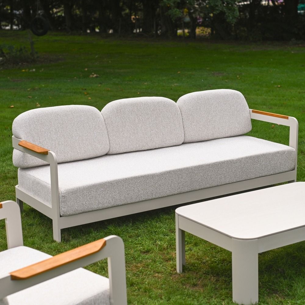 The Horizon 4 Piece Patio Suite Showing a Full View of the Sofa as well as Marble Effect Table