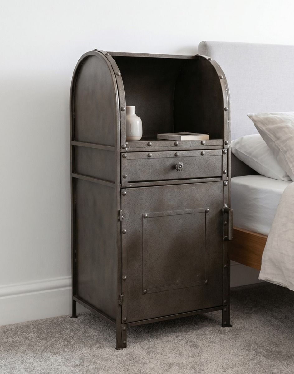 The Industrial Metal Bedside Cabinet in a Carpeted Bedroom next to a Comfy Bed - Digital Illustration