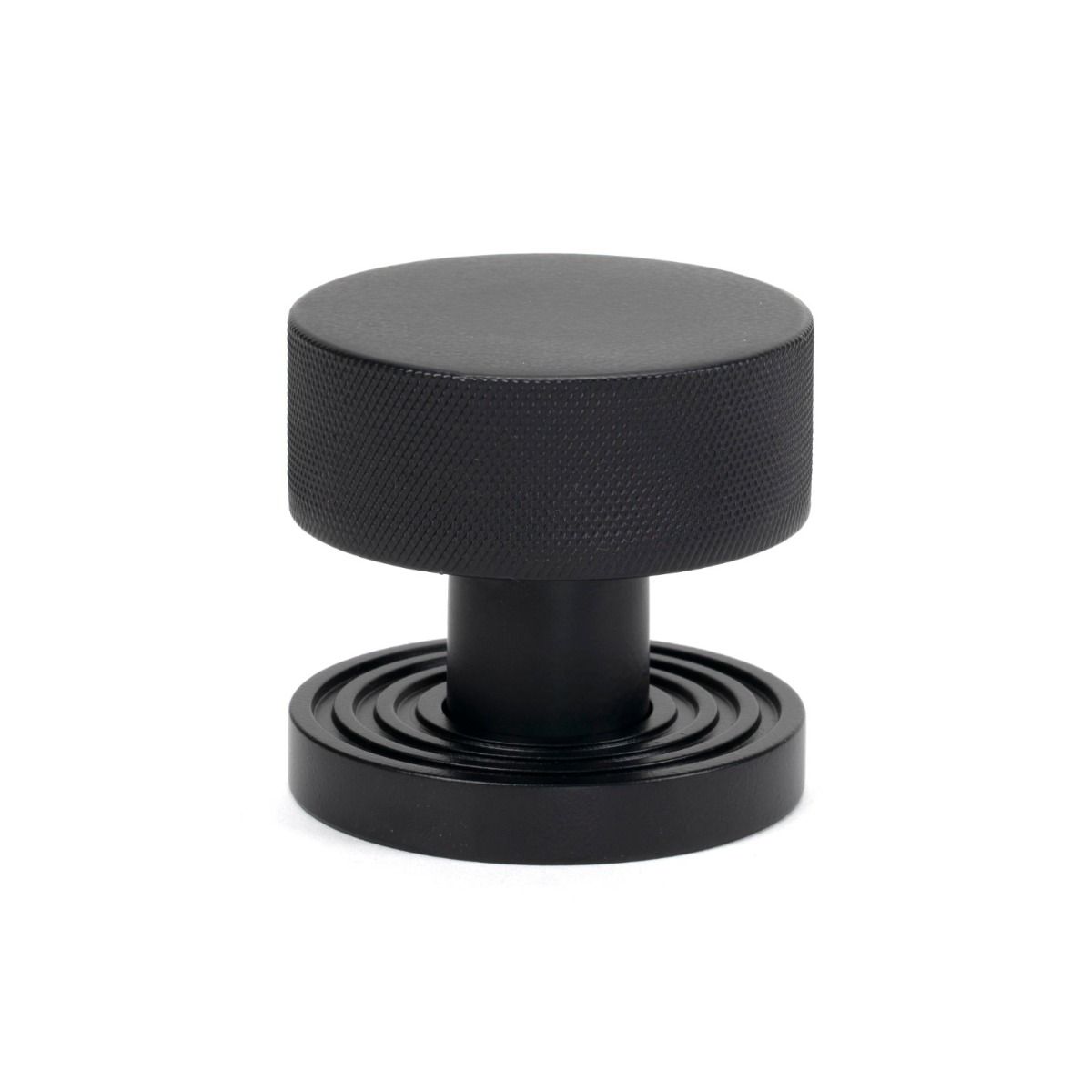 The Knurled Mortice/Rim Knob Set on a Beehive Rose in Matt Black Shown Upright on a White Background 