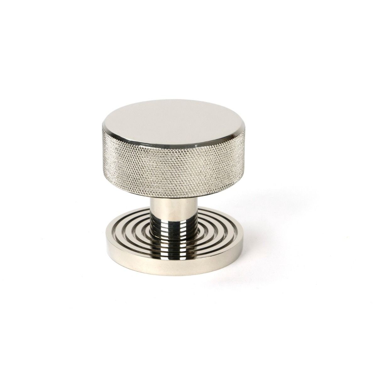 The Knurled Mortice/Rim Knob Set on a Beehive Rose in Polished Nickel Shown Upright on a White Background 