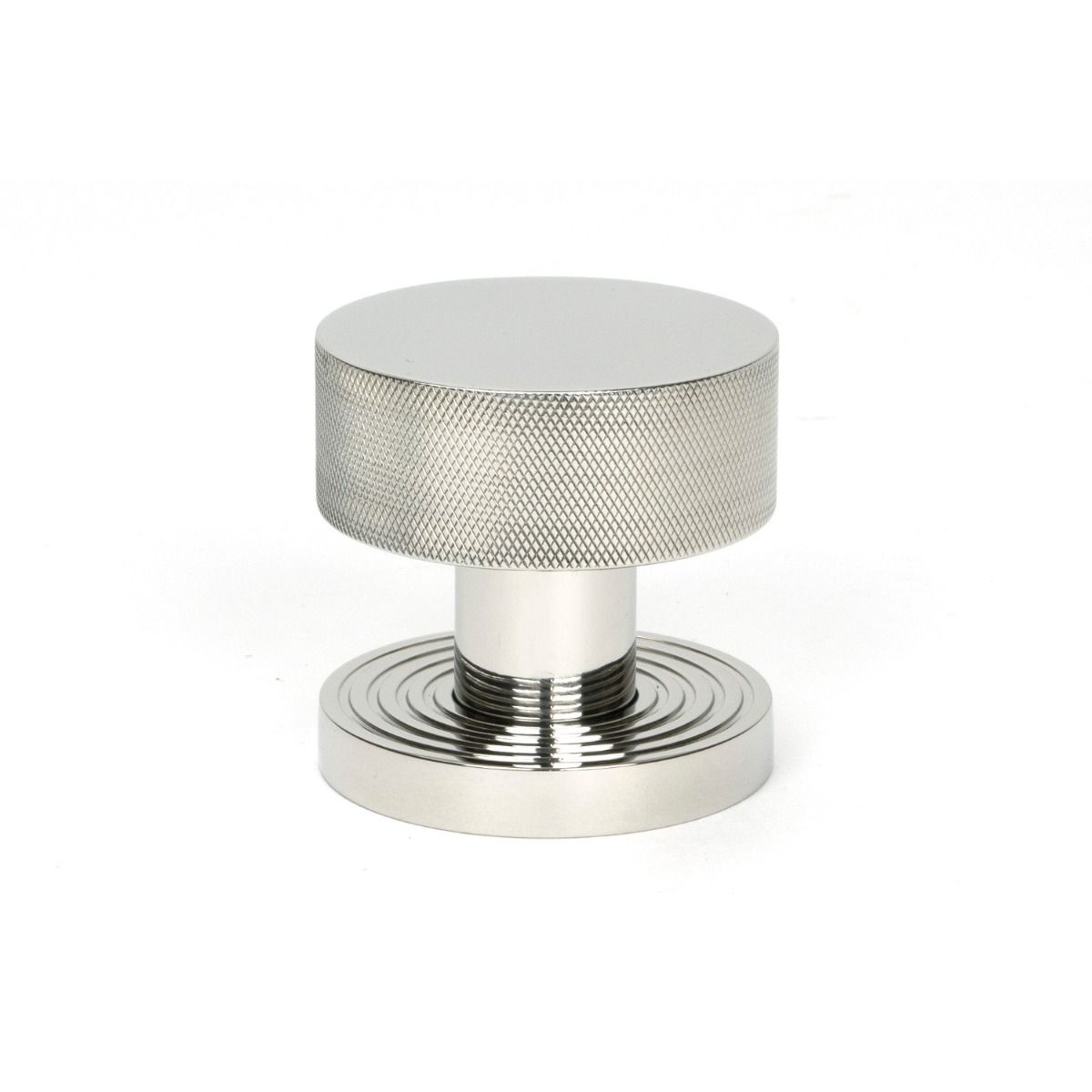 The Knurled Mortice/Rim Knob Set on a Beehive Rose in Polished Stainless Steel Shown Upright on a White Background 
