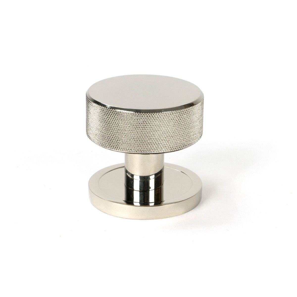 The Knurled Mortice/Rim Knob Set on a Plain Rose in Polished Nickel Shown Upright on a White Background 