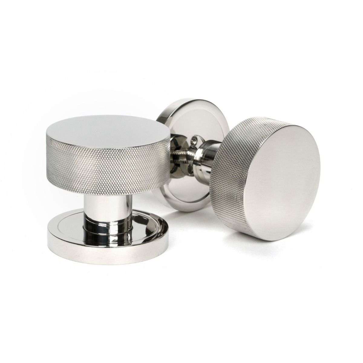 The Knurled Mortice/Rim Knob Set on a Plain Rose in Polished Stainless Steel Shown Upright and on its Side 