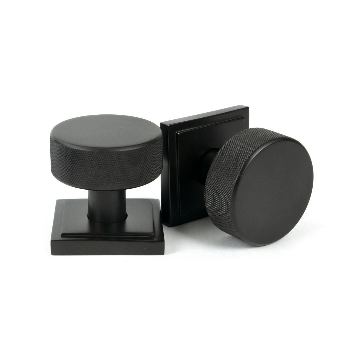 The Knurled Mortice/Rim Knob Set on a Square Rose in Aged Bronze Shown Upright and on its Side 